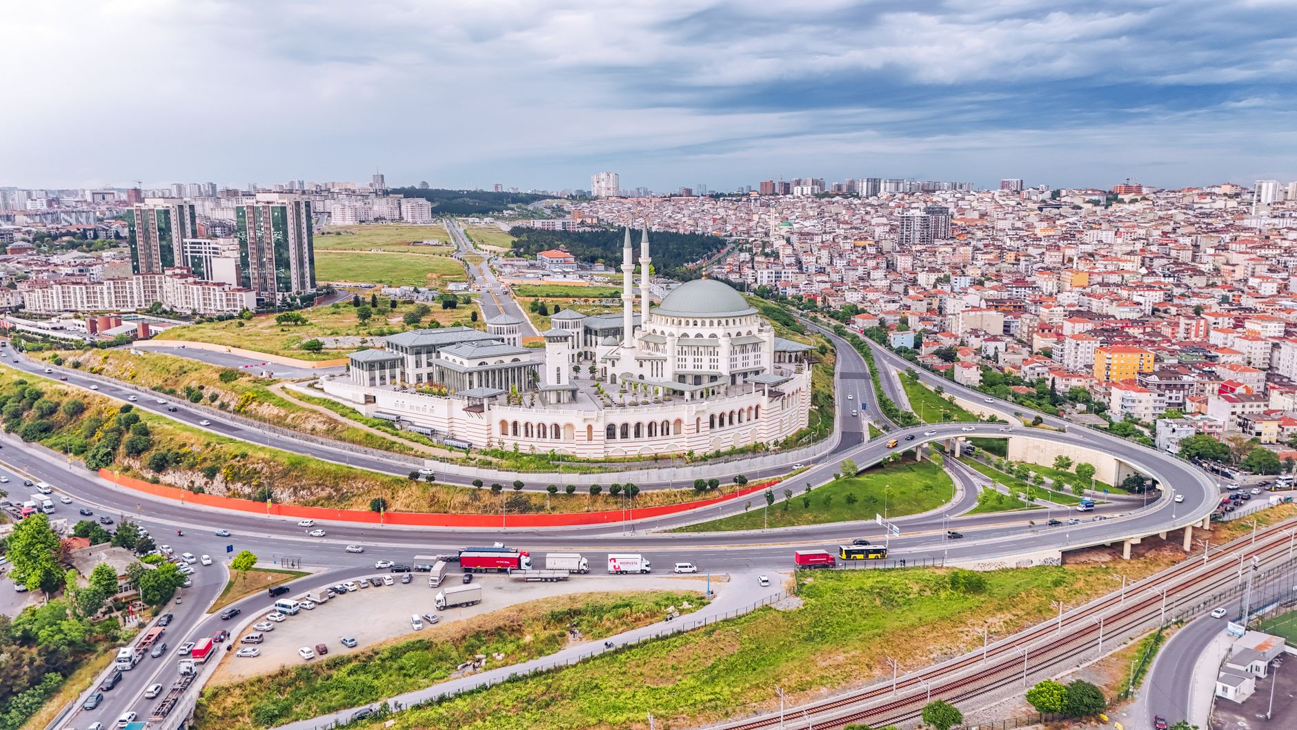 Discover the Grand Çamlıca Mosque surrounded by Istanbul's urban landscape in this aerial view. — How will you be benefited f