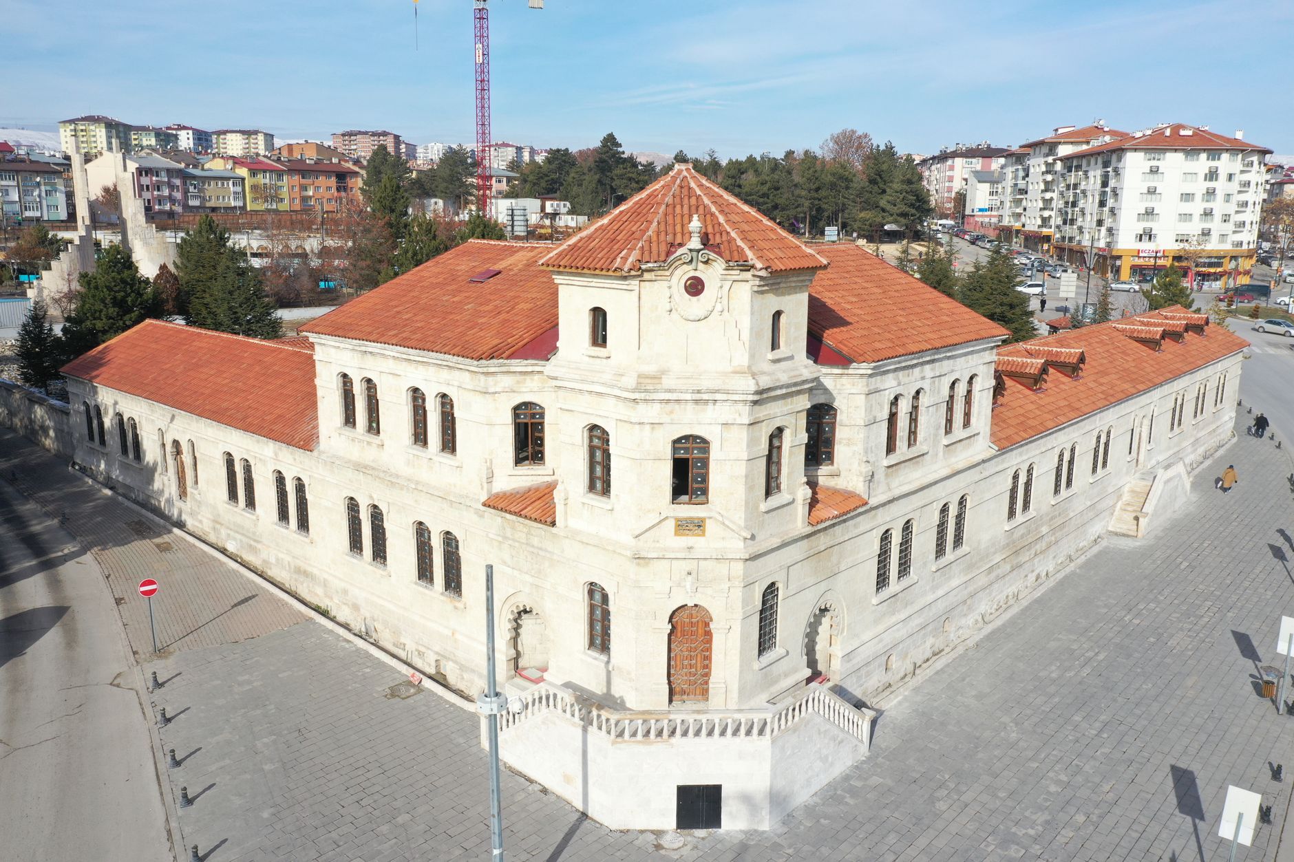 Aerial view of a historic stone building with red tile roofs in Sivas, Turkey, on a sunny day. — Symptoms of Bad Brake: Don't